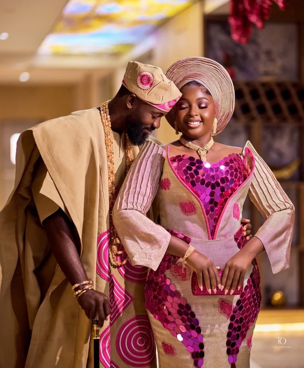 Trendy Nigerian wedding fabrics displayed in bright colors and patterns